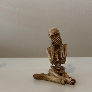 Contemplative Skeleton Figurine in Tan